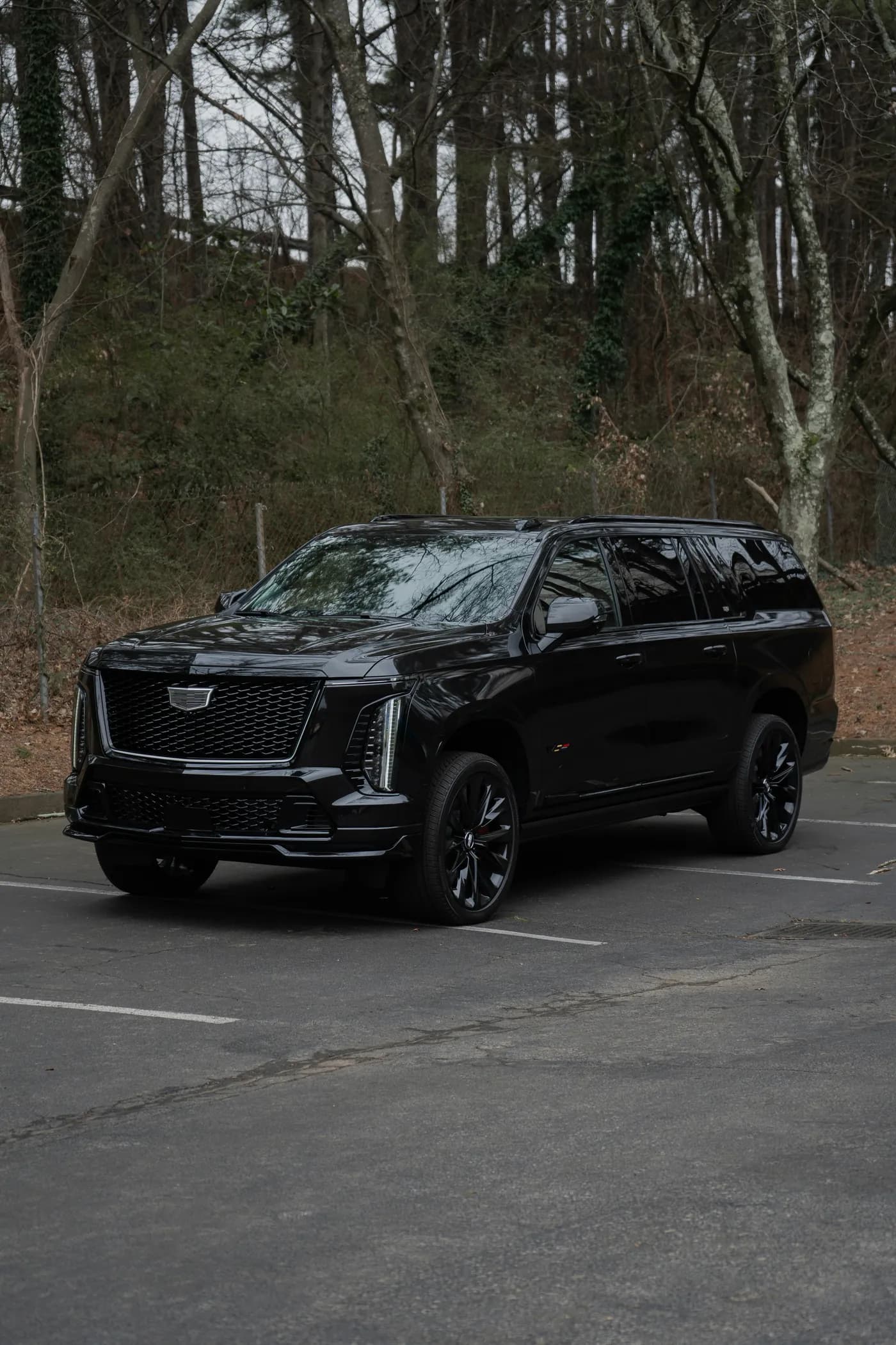 Black Cadillac Escalade luxury SUV