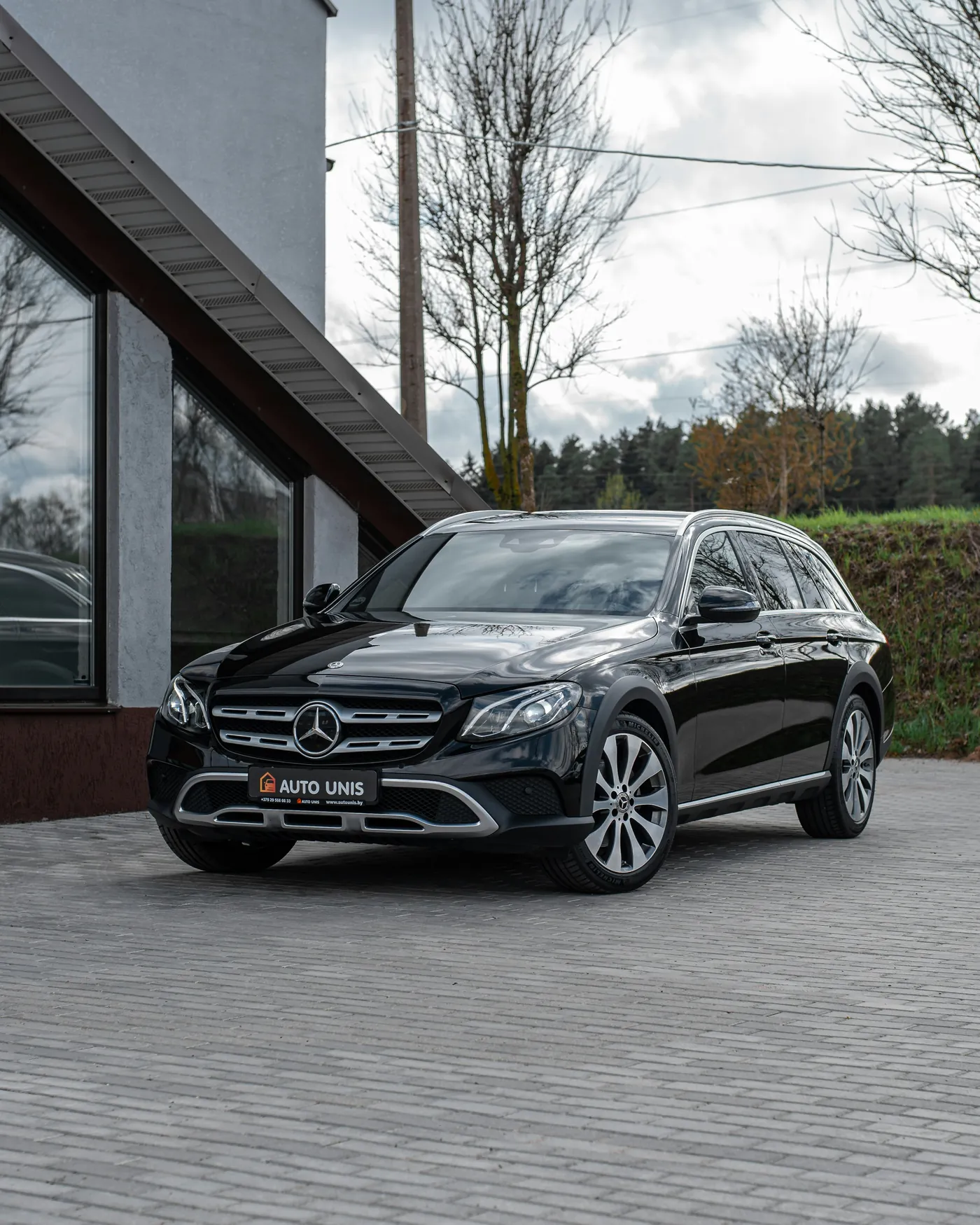 Black executive Mercedes sedan