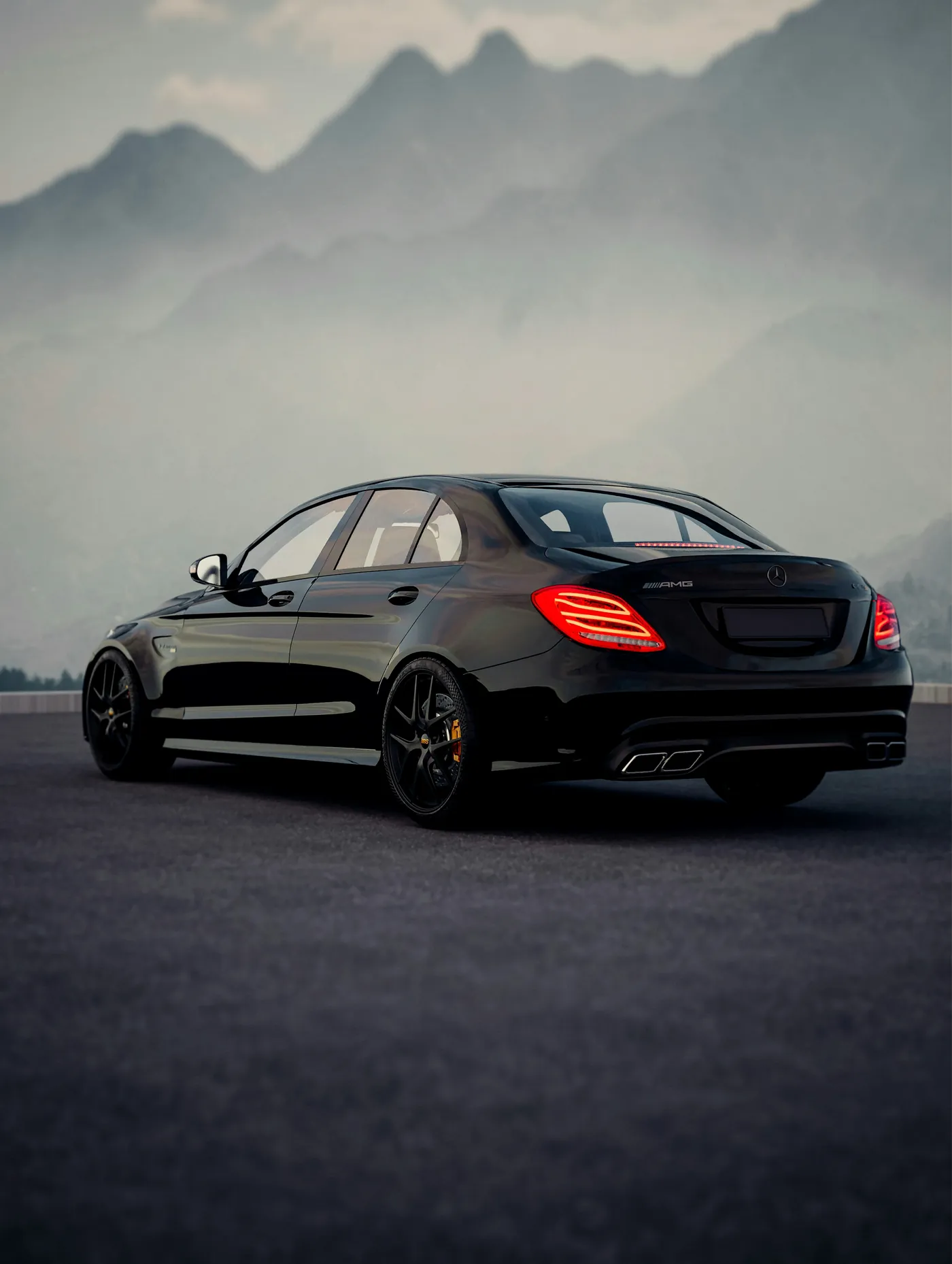Black luxury sedan in a scenic city setting